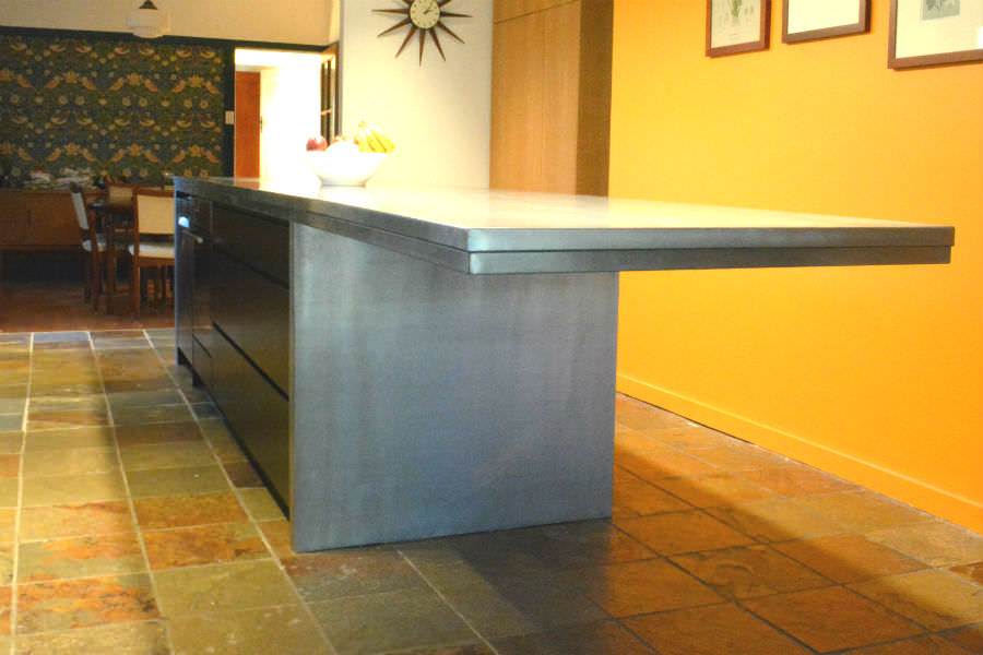 Custom made kitchen With cantilever zinc bench top. Custom made joinery and cabinet making