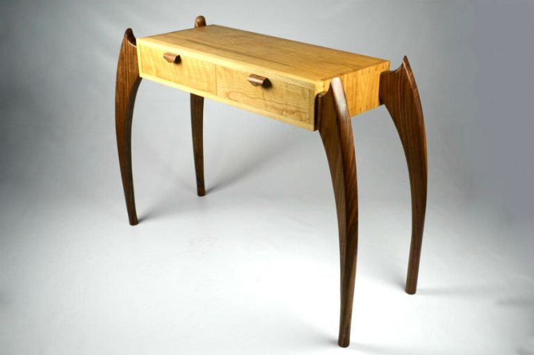 Custom made timber furniture. Custom made furniture and furniture maker. WHITE OAK & BLACK WALNUT CONSOLE TABLE Made from White Oak and Black Walnut featuring our unique leg design for an elegant yet dynamic classic modern look. With hand cut dovetails construction for strength. This versatile design can also be made as a desk.