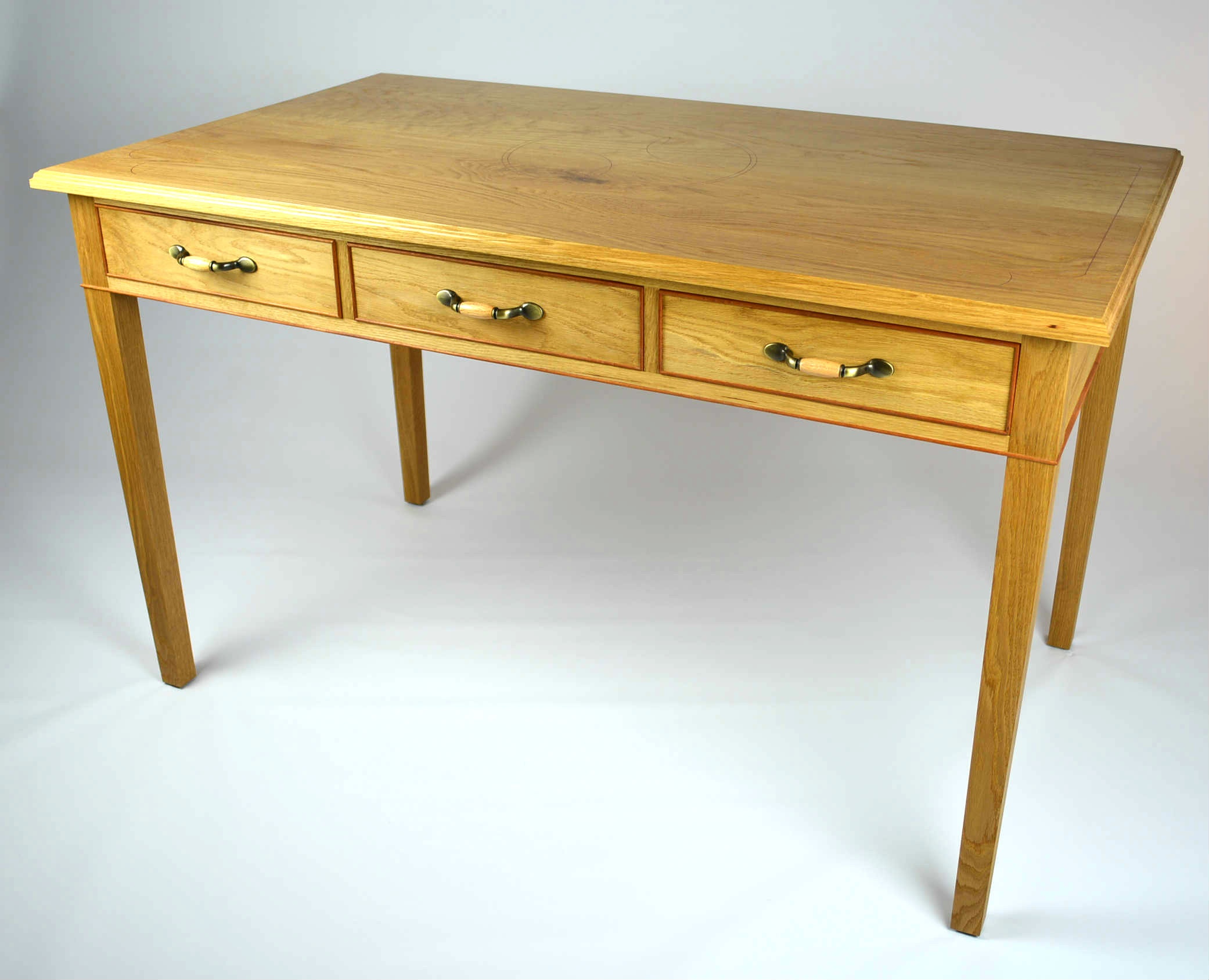 Custom made timber furniture. Custom made furniture and furniture maker. Custom made timber desk made from White Oak and Fijian Mahogany Desk