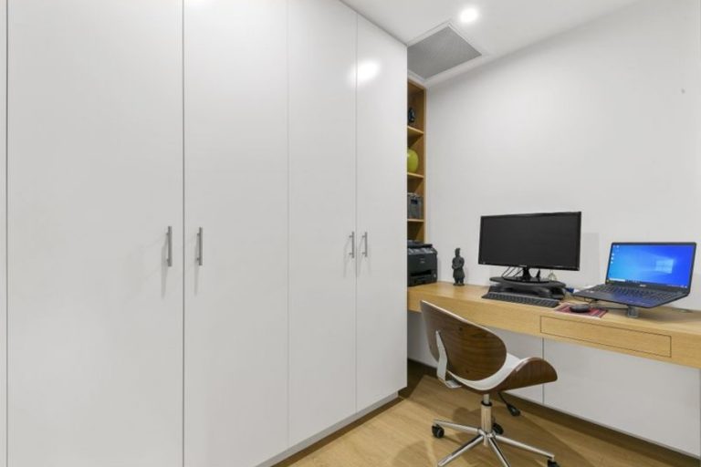 Designed to create a warm inviting atmosphere, this wardrobe and study nook with push touch flush mount draw. Designed to maximize space in a small apartment in Beecroft in a modern contemporary style. Custom made joinery and cabinet making